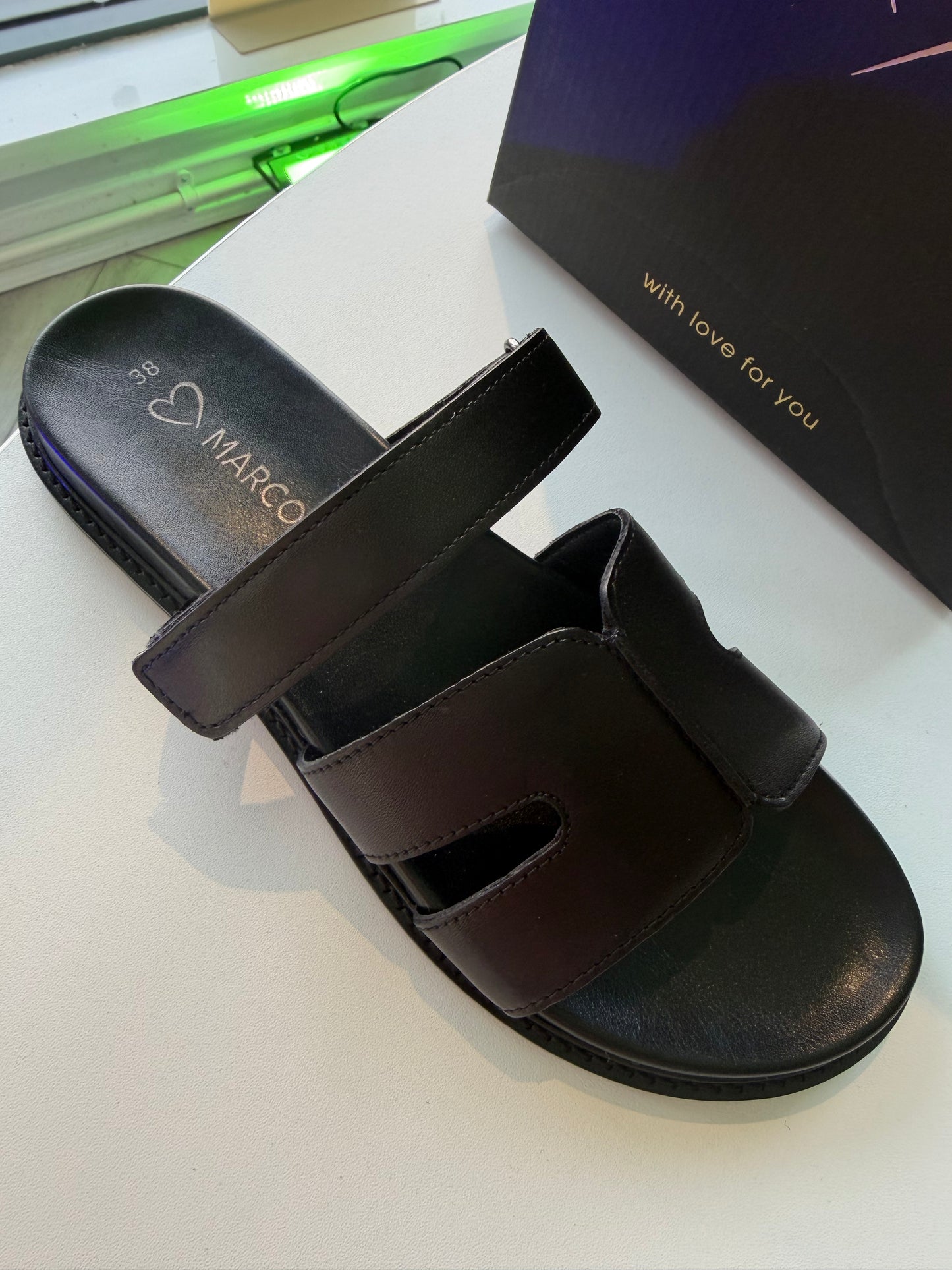 Black Leather Sliders by Marco Tozzi