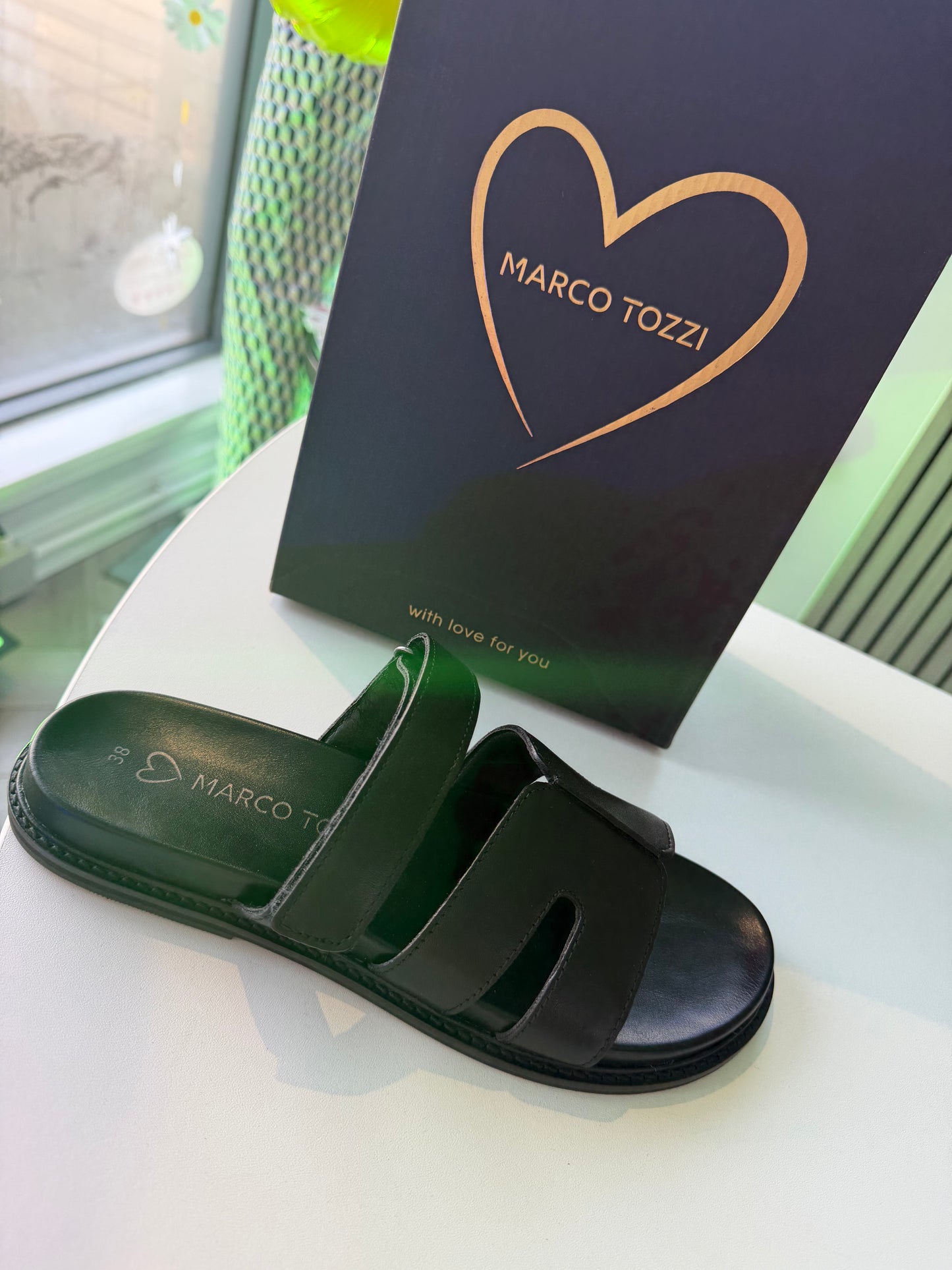 Black Leather Sliders by Marco Tozzi
